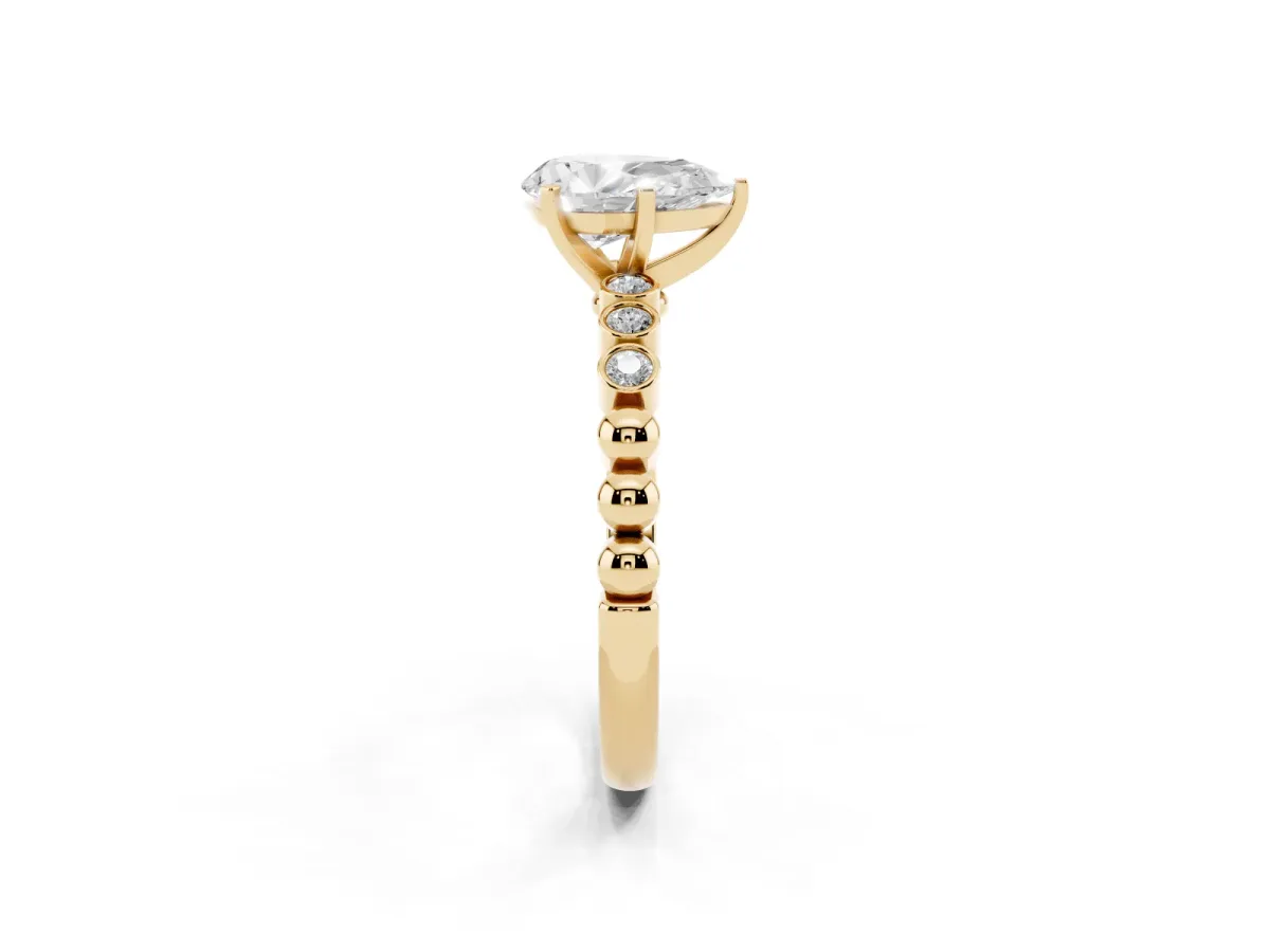 Pear Cut Solitaire Bezel Accent Diamond Engagement Ring with Beaded Band and Four-Prong Setting Yellow gold