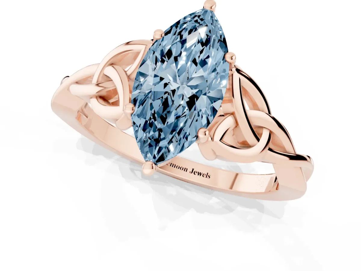 Fancy Blue Marquise Cut Diamond Solitaire Engagement Ring with Celtic Knot Band and Four-Prong Setting Rose gold