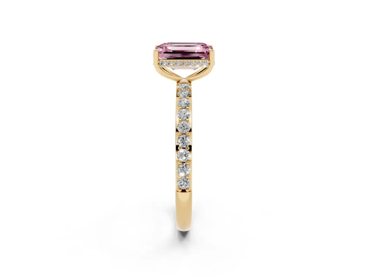 Fancy Pink Emerald Cut Diamond Solitaire Ring with Pavé Band and Hidden Halo Yellow gold