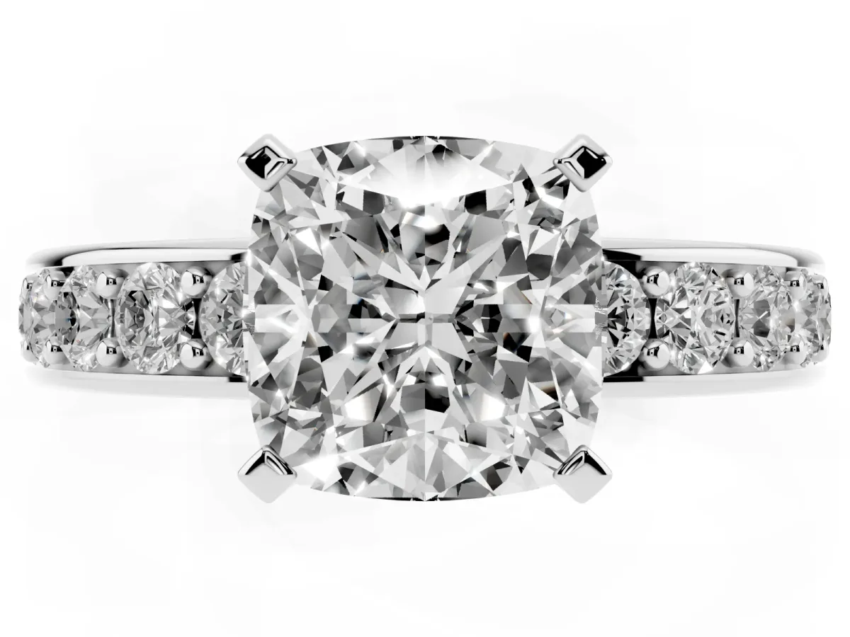 Cushion Cut Diamond Engagement Ring with Channel Set Round Band and Prong Setting Platinum