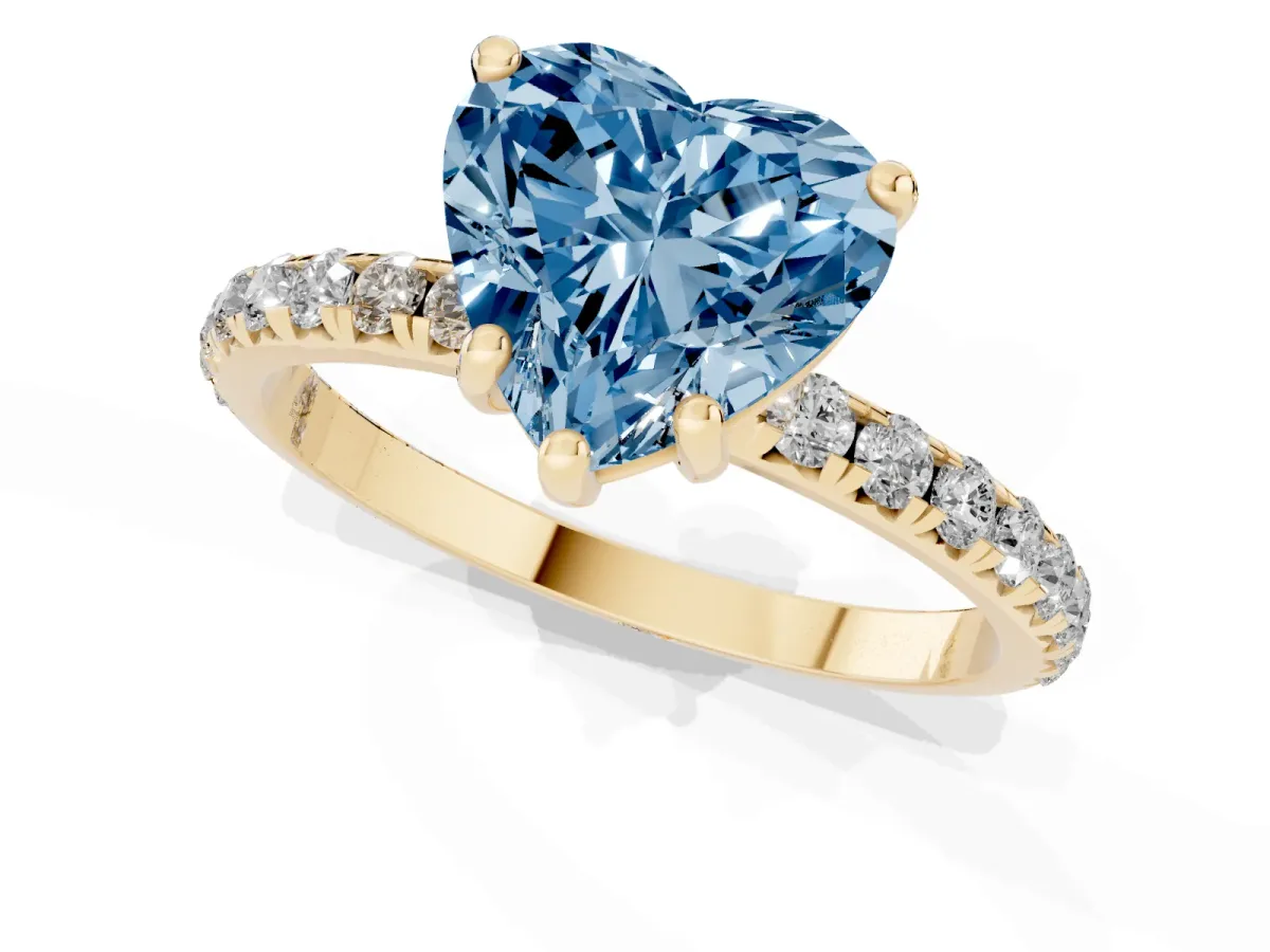 Fancy Blue Heart Cut Cut Diamond Solitaire Ring with Micro Pave Band and Four Prong Setting Yellow gold