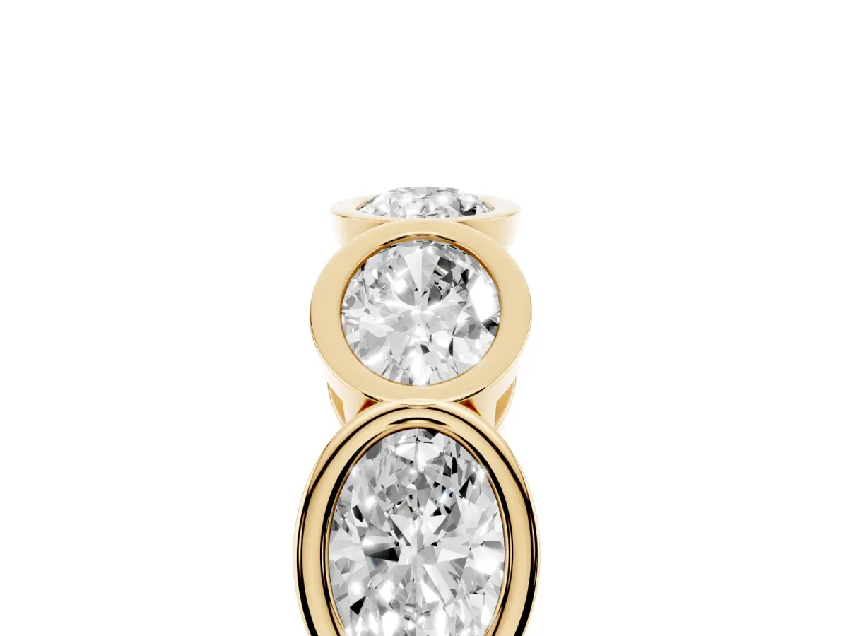 Oval Diamond Bezel Set Eternity Wedding Band Yellow gold
