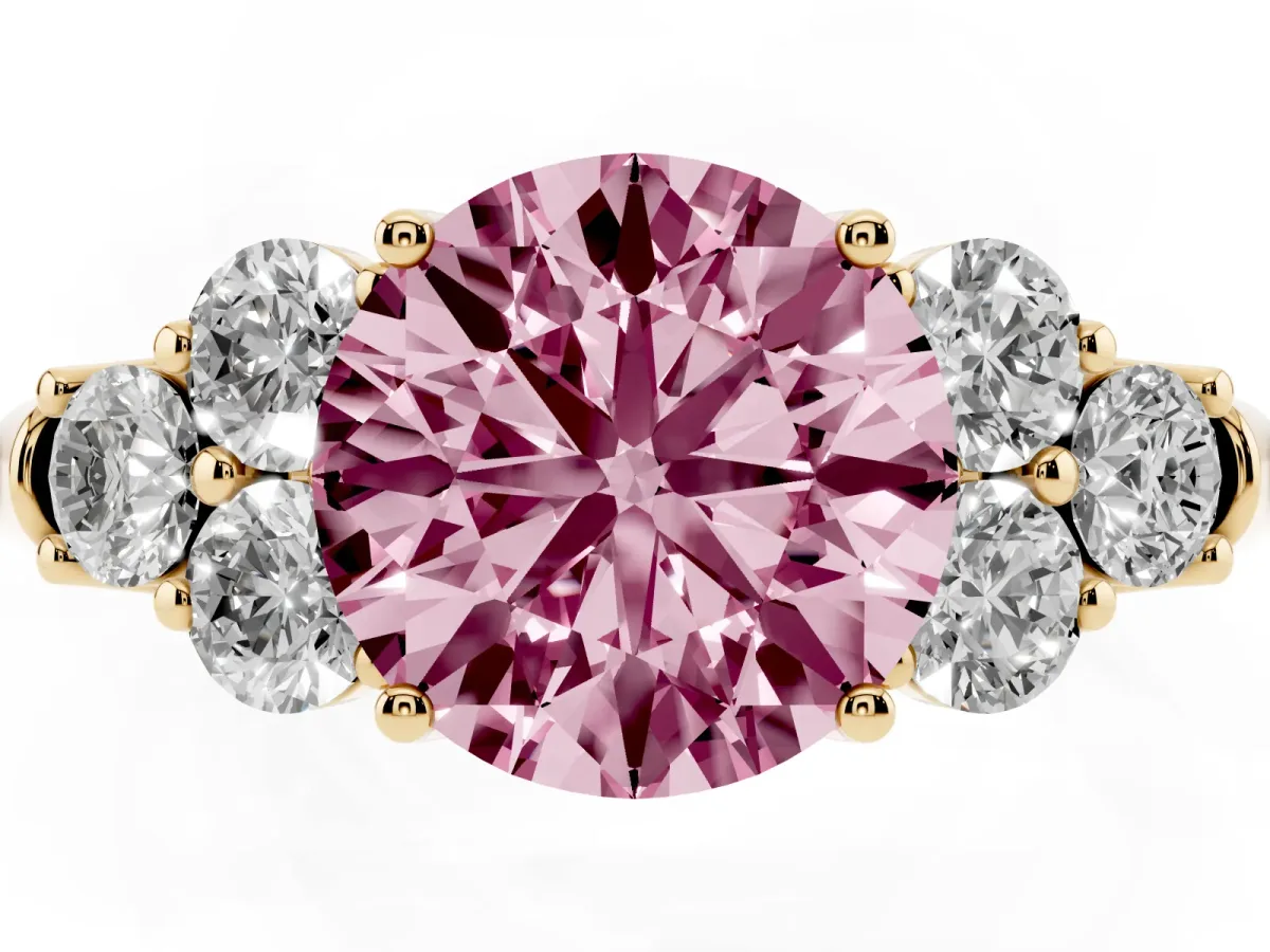 Fancy Pink Round Cut Cut Diamond Cluster Ring with Round Accent Stones and Prong Setting on a Classic Band Yellow gold