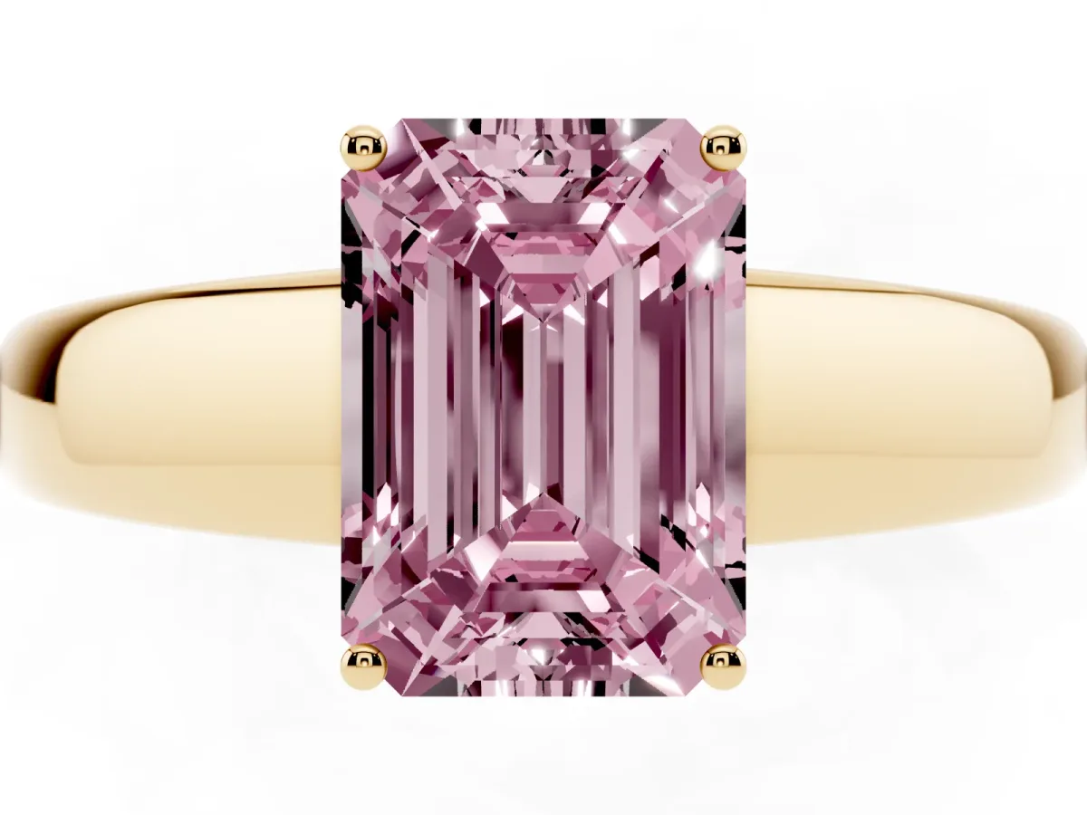 Fancy Pink Emerald Cut Solitaire Diamond Ring with Tapered Band and Four-Prong Setting Yellow gold