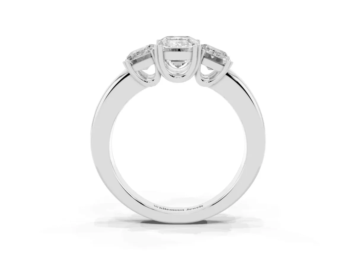 Three-Stone Emerald Cut Cut Diamond Ring with Channel Set Band and Four-Prong Setting Platinum