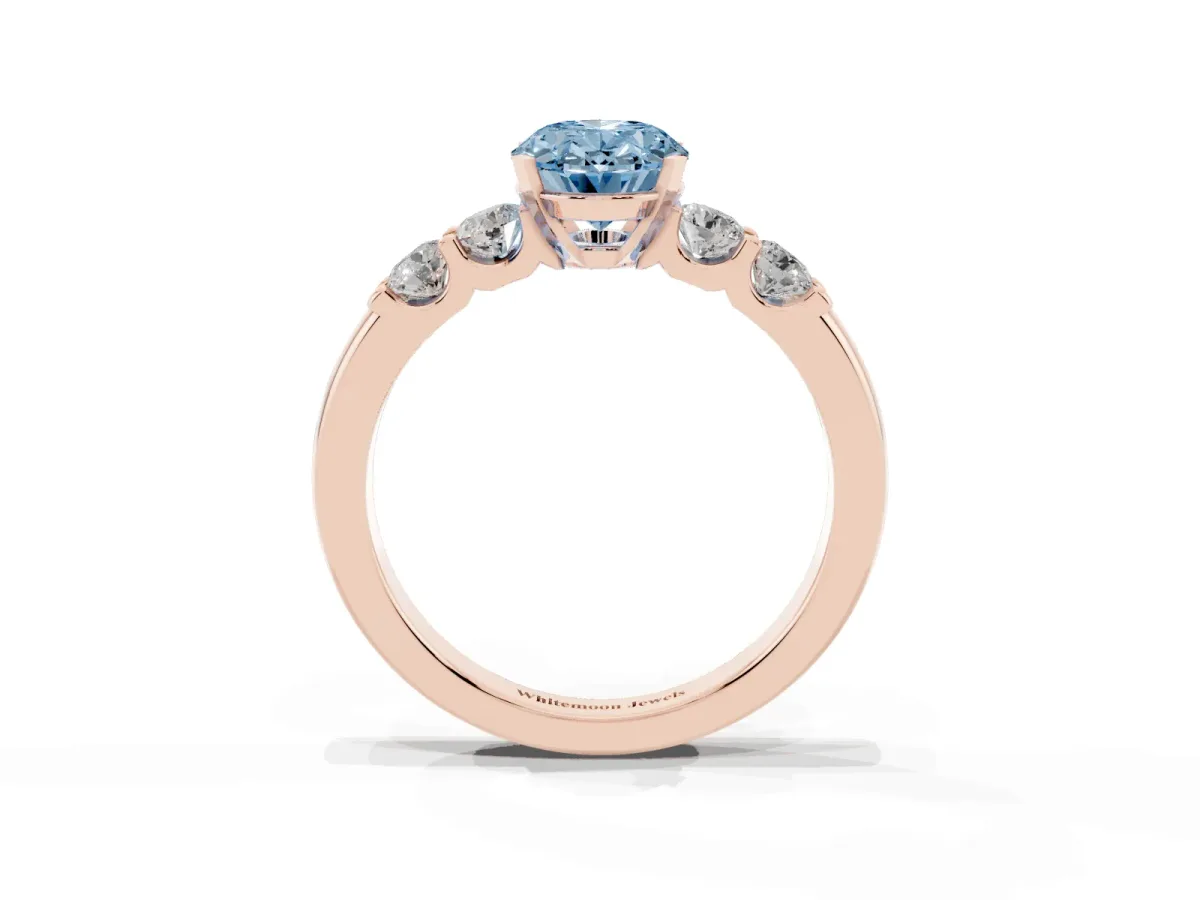 Fancy Blue Oval Cut Brilliant Cut Diamond Five-Stone Prong Set Engagement Ring with Channel Band Rose gold