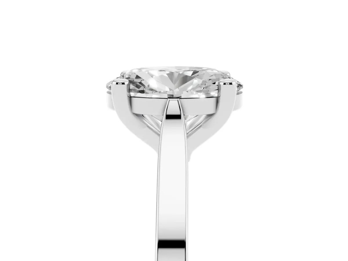 Oval Cut Solitaire Diamond Ring with Four-Prong Setting and Tapered Band Silver