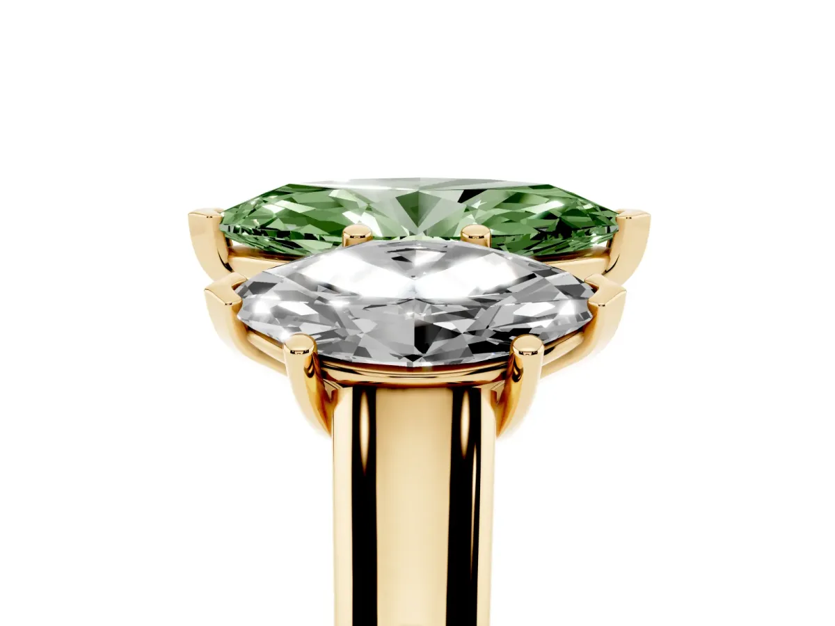 Fancy Green Marquise Cut Three-Stone Diamond Ring with Prong Setting on a Classic Band Yellow gold