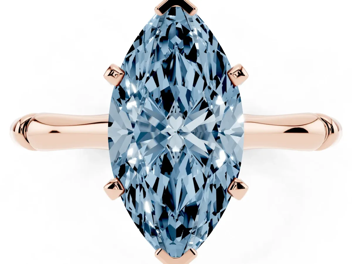 Fancy Blue Marquise Cut Solitaire Diamond Ring with Bamboo Band and Four-Prong Setting Rose gold