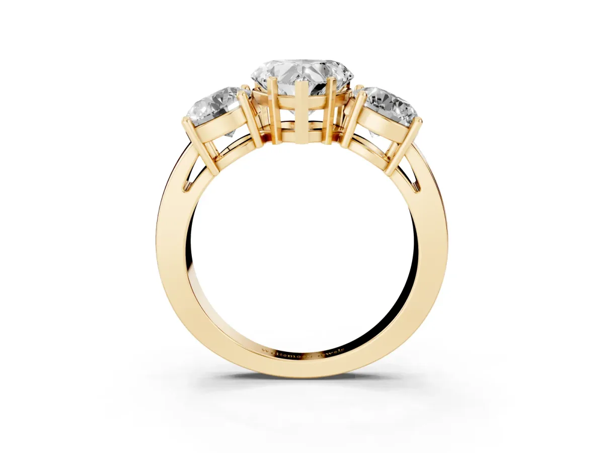 Three-Stone Heart Cut Diamond Ring with Round Side Stones, Classic Band, and Four-Prong Setting Yellow gold