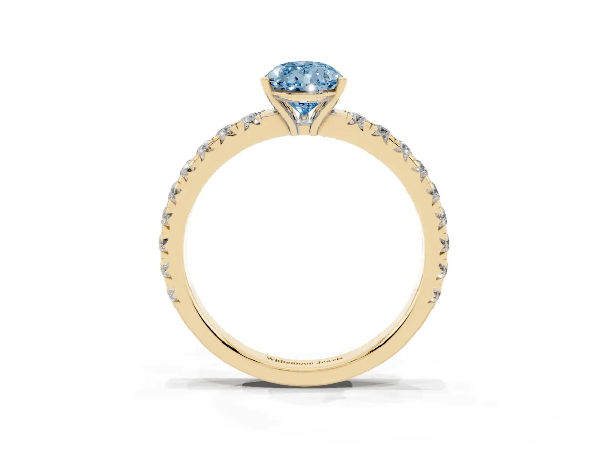 Fancy Blue Pear Cut Diamond Pavé Solitaire Engagement Ring with Four-Prong Setting Yellow gold