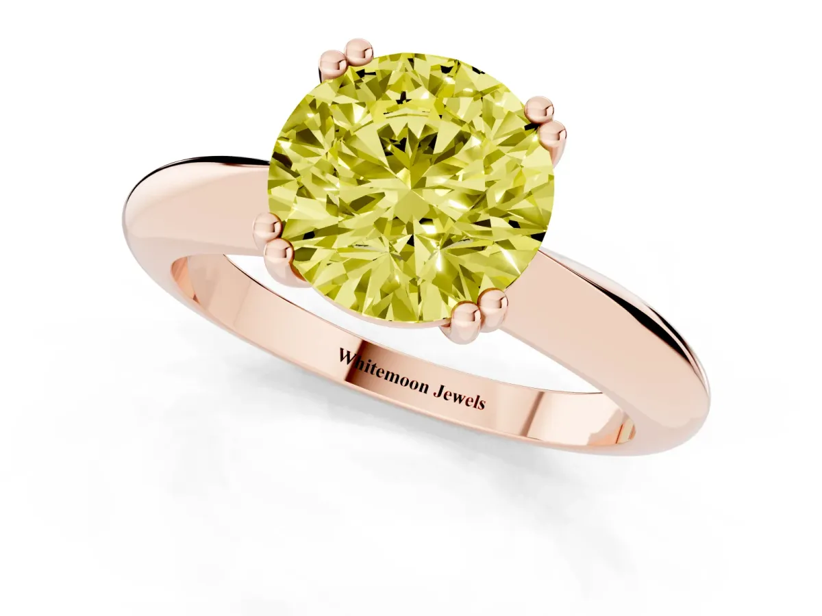 Fancy Yellow Round Cut Cut Solitaire Engagement Ring with Tapered Band and Four-Prong Setting Rose gold