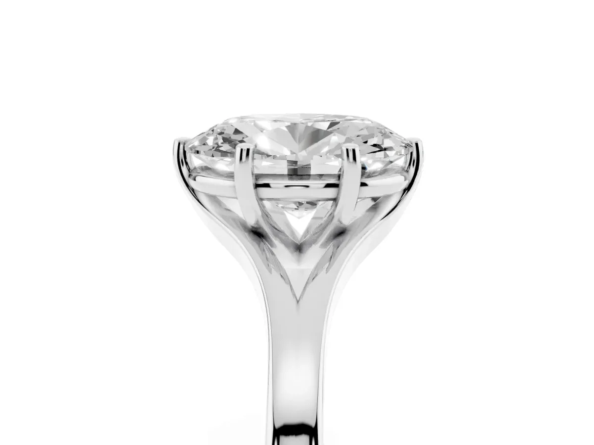 Oval Cut Solitaire Diamond Ring with Six-Prong Setting and Tapered Band Platinum