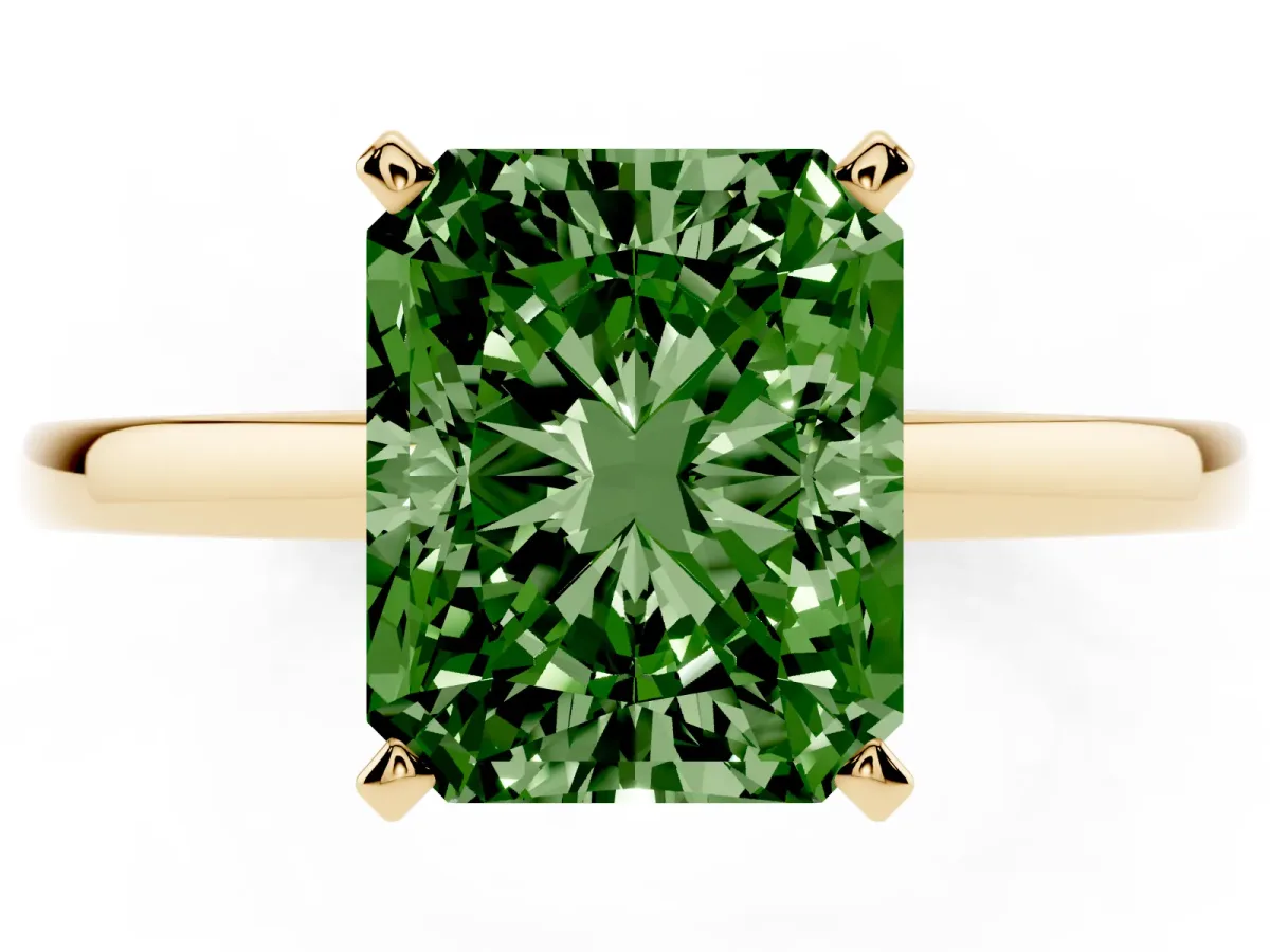 Fancy Green Radiant Cut Solitaire Diamond Engagement Ring with Four-Prong Setting on a Classic Band Yellow gold