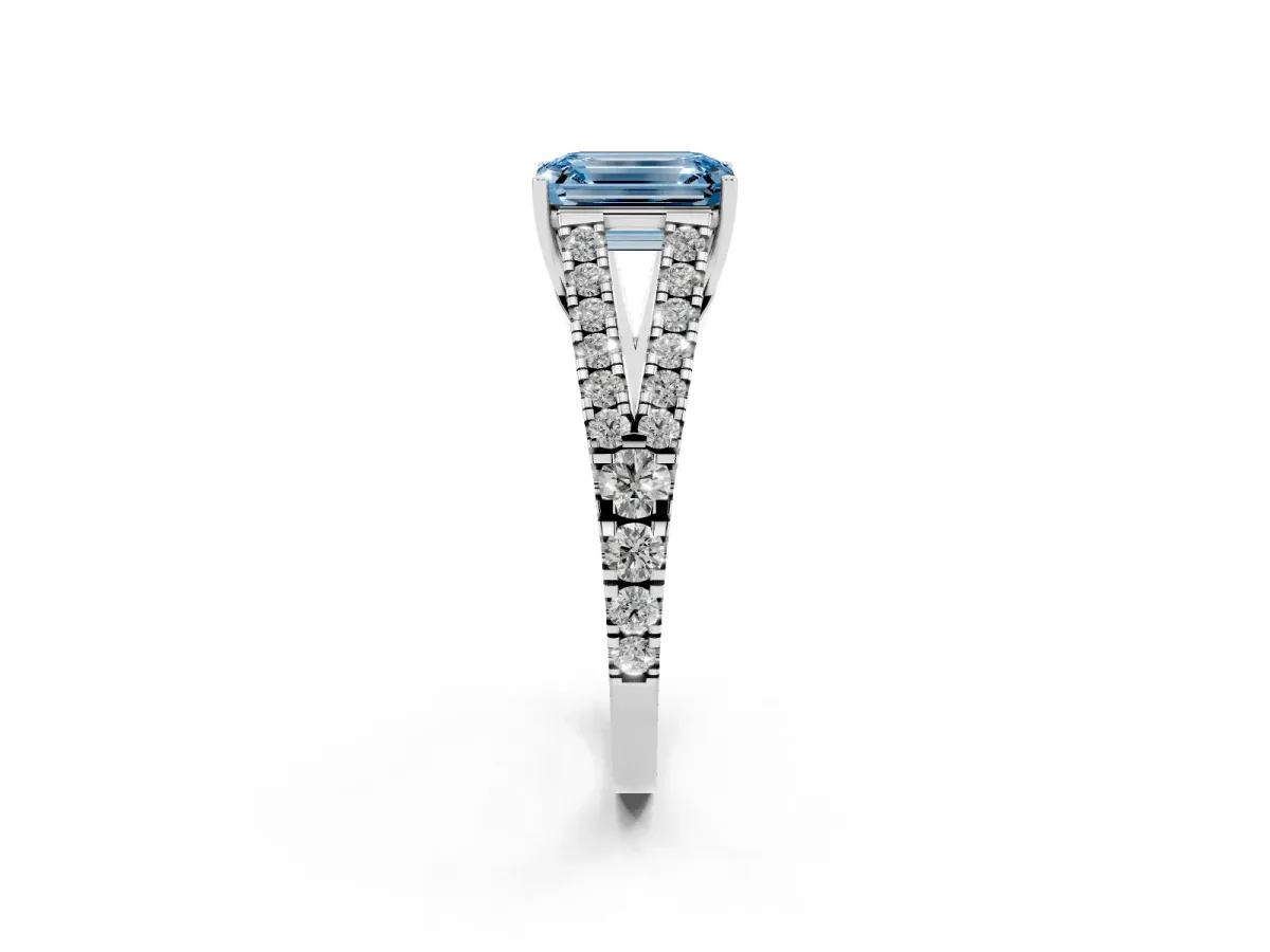 Fancy Blue Emerald Cut Diamond Split Shank Pavé Engagement Ring with Four-Prong Setting Silver
