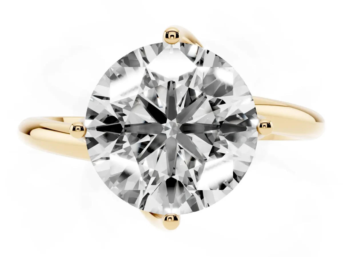 Round Cut Diamond Solitaire Engagement Ring with Four-Prong Setting and Classic Band Yellow gold