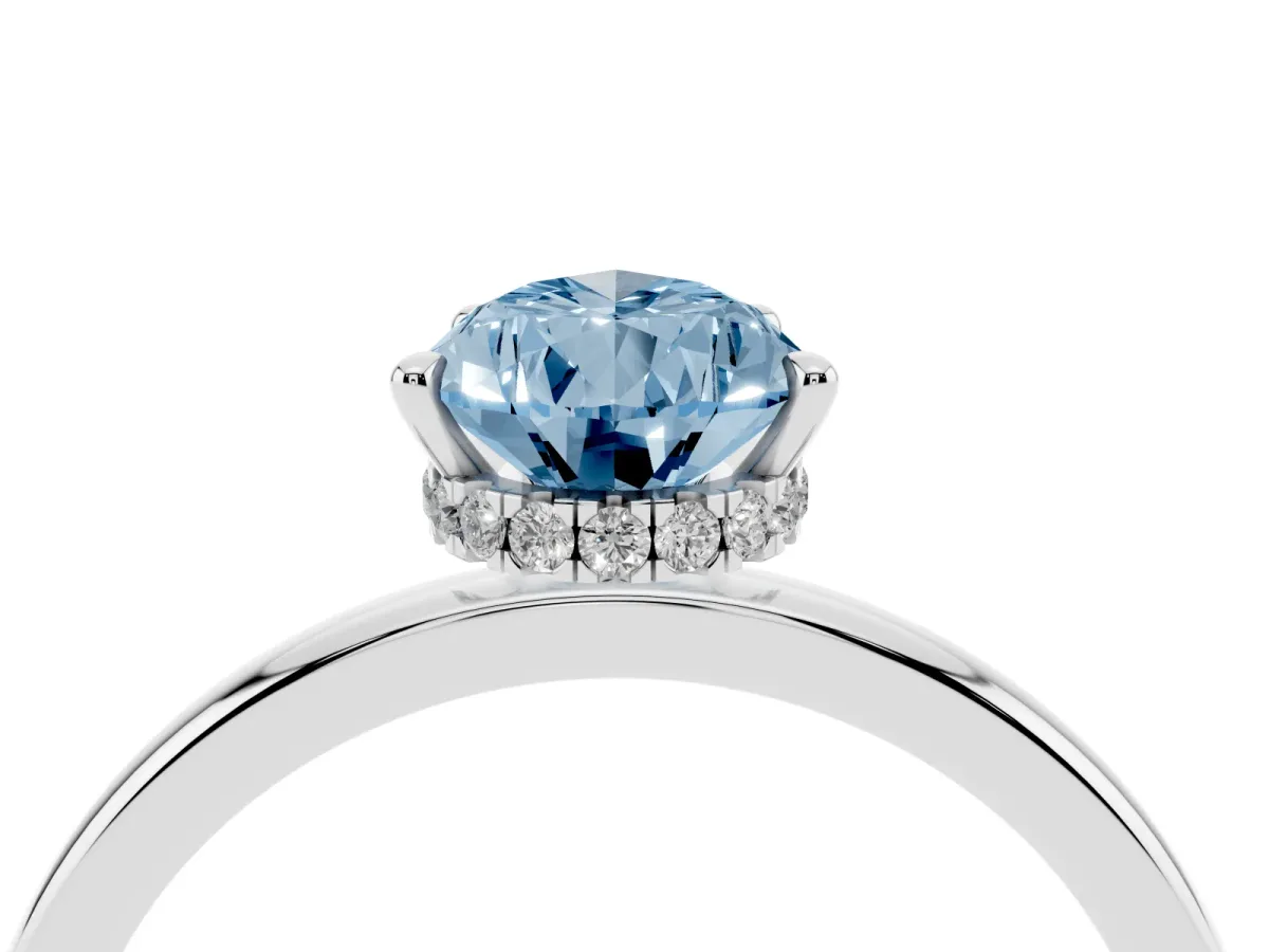 Fancy Blue Pear Cut Solitaire Engagement Ring with Cathedral Band and Four-Prong Setting White gold