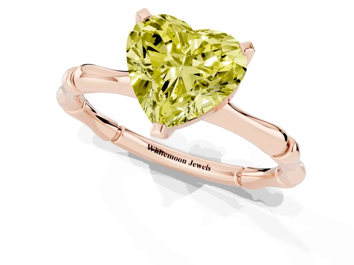 Fancy Yellow Heart Cut Solitaire Diamond Ring with Bamboo Band and Four-Prong Setting Rose gold