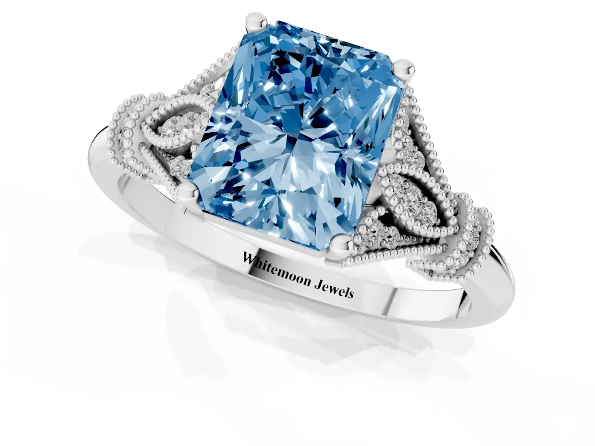 Fancy Blue Radiant Cut Diamond Solitaire Ring with Floral Filigree and Pave Accents White gold