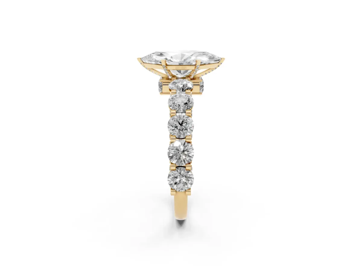 Marquise Cut Diamond Side Stone Engagement Ring with Four-Prong Setting Yellow gold