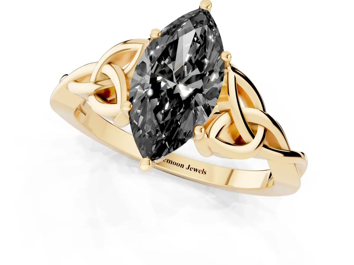 Fancy Black Marquise Cut Diamond Solitaire Engagement Ring with Celtic Knot Band and Four-Prong Setting Yellow gold