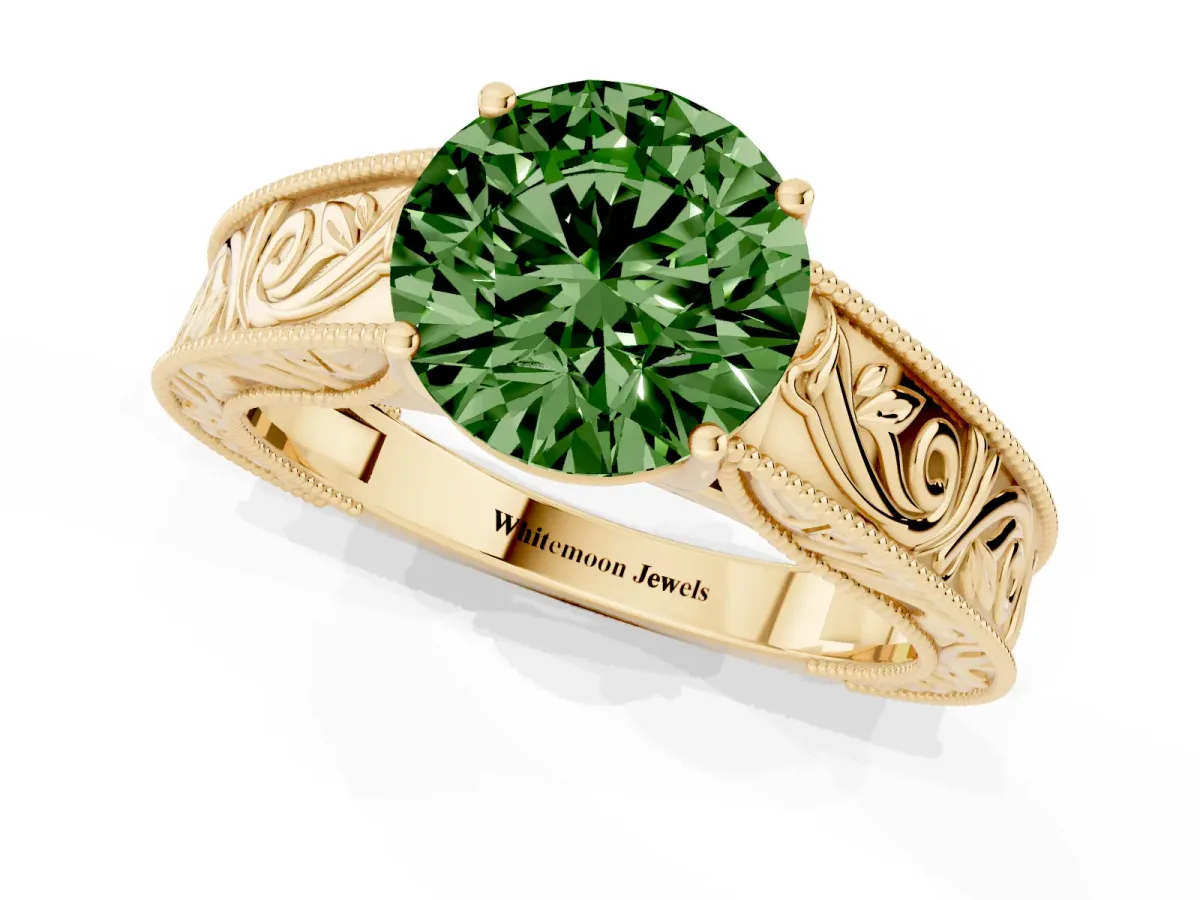Fancy Green Round Cut Diamond Solitaire Ring with Engraved Band and Four-Prong Setting Yellow gold