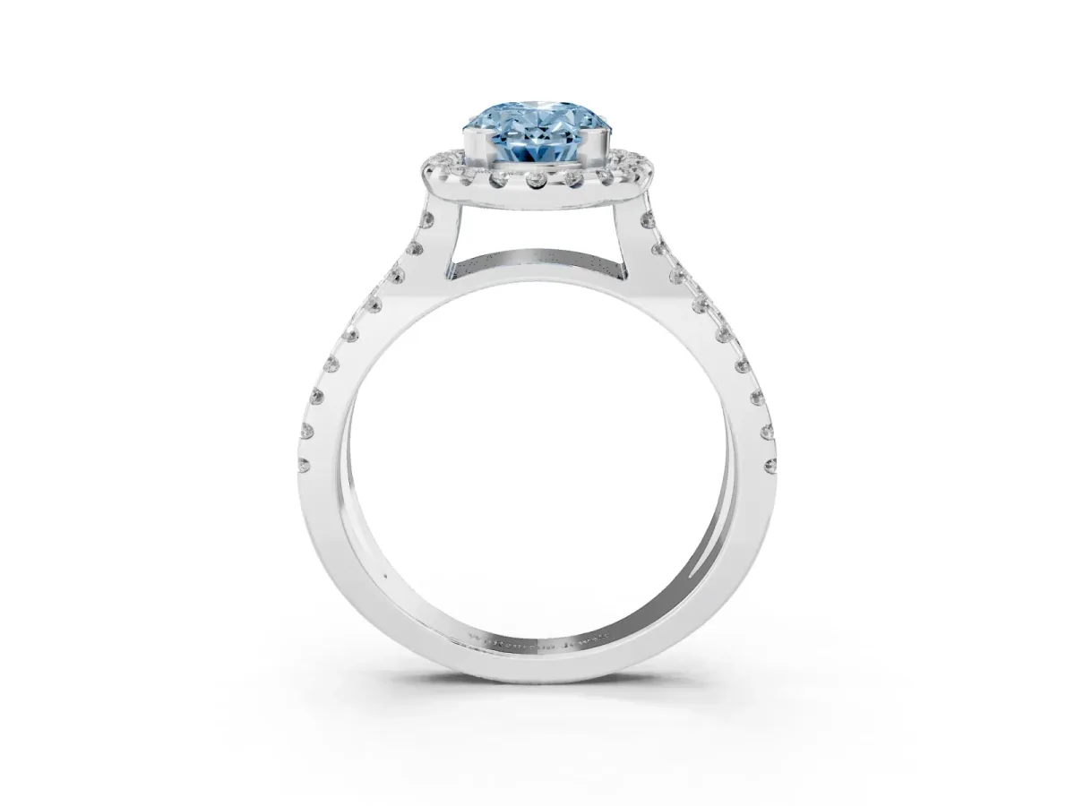 Fancy Blue Oval Cut Diamond Halo Ring with Split Shank Pavé Band and Prong Setting Silver