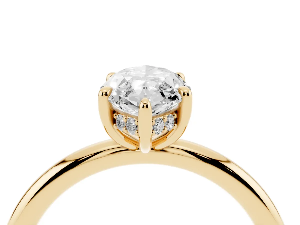 Marquise Cut Diamond Solitaire Ring with Thin Band and Four-Prong Setting Yellow gold