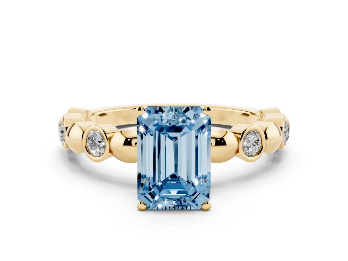 Fancy Blue Emerald Cut Solitaire Bezel-Set Diamond Ring with Beaded Band and Four-Prong Setting Yellow gold