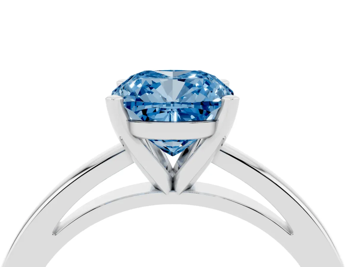 Fancy Blue Cushion Cut Solitaire Diamond Engagement Ring with Four-Prong Setting on a Classic Band Platinum