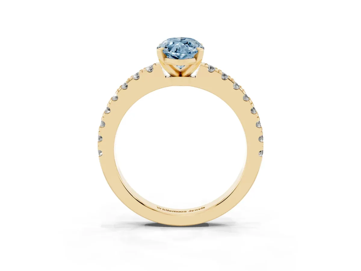 Fancy Blue Marquise Cut Solitaire Diamond with Pavé Band and Four-Prong Setting Yellow gold