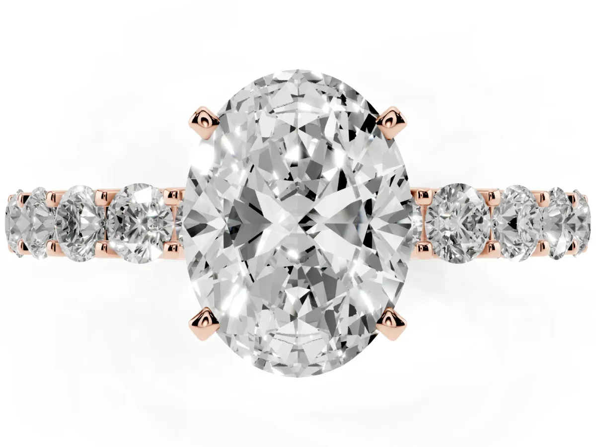 Oval Cut Diamond Solitaire Ring with Shared Prong Pavé Band and Four-Prong Setting Rose gold
