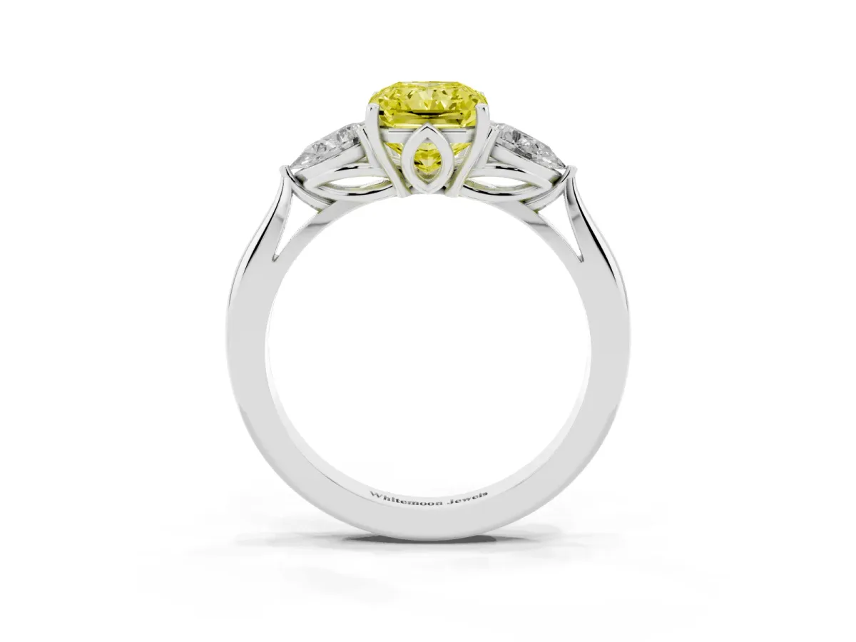 Fancy Yellow Three-Stone Radiant Cut Diamond Ring with Pear Side Stones in Four-Prong Setting Silver