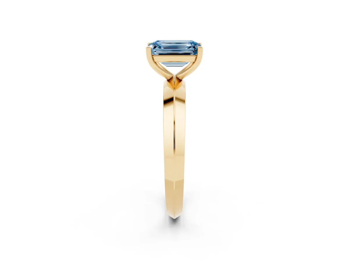 Fancy Blue Emerald Cut Cut Solitaire Engagement Ring with Flat Band and Four-Prong Setting Yellow gold