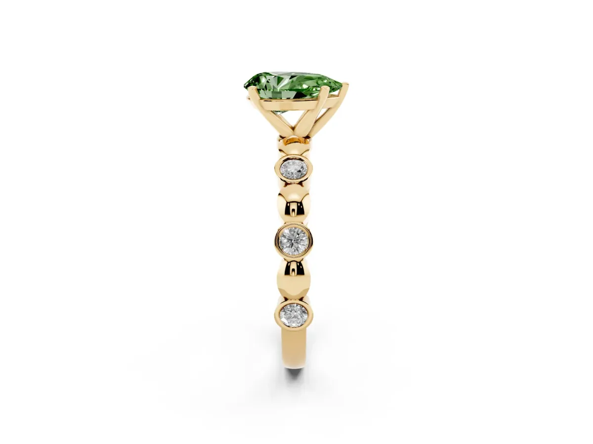 Fancy Green Pear Cut Solitaire Bezel-Set Diamond Ring with Beaded Band and Four-Prong Setting Yellow gold
