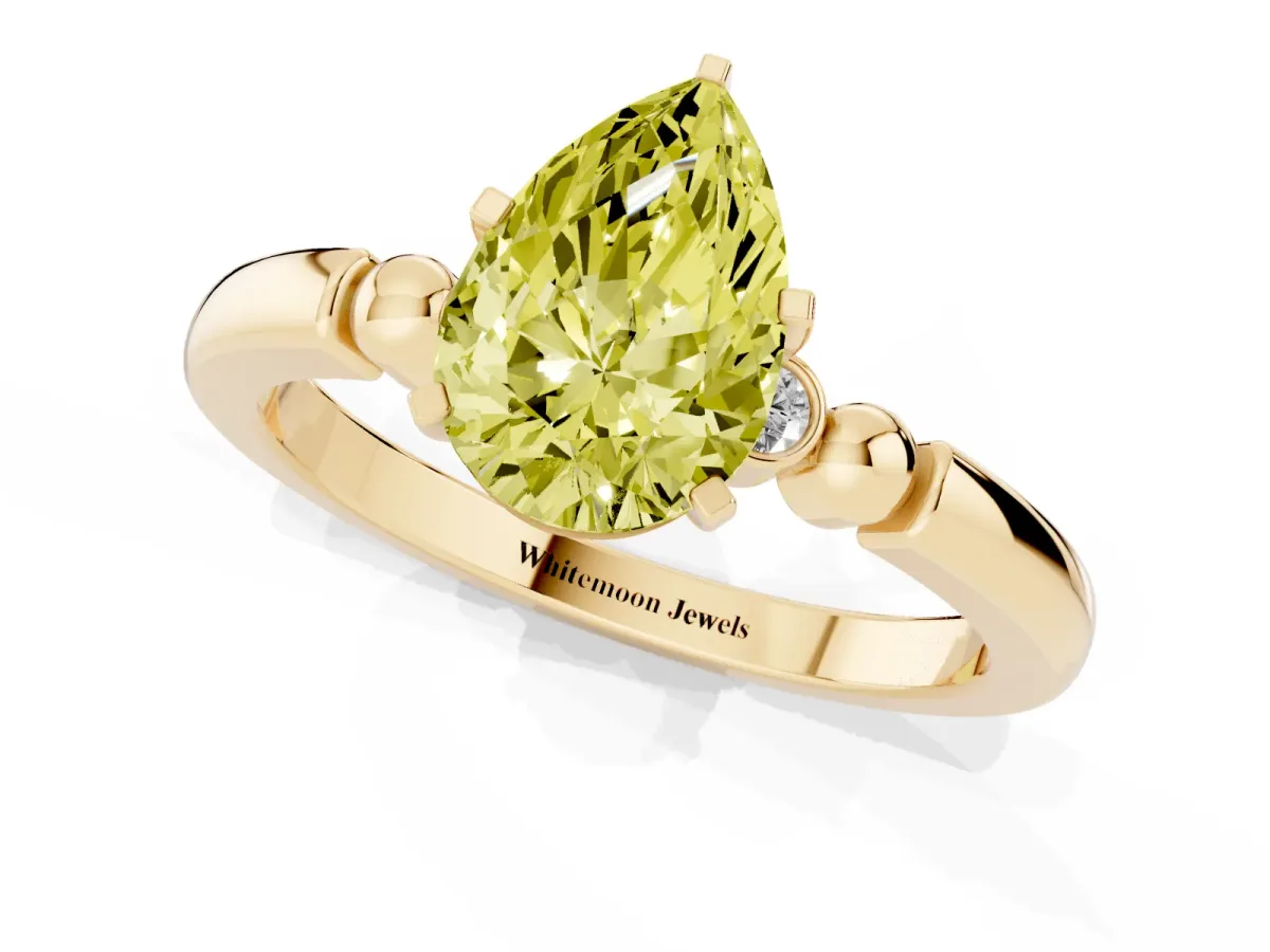 Fancy Yellow Pear Cut Solitaire Beaded Band with Four-Prong Setting Yellow gold