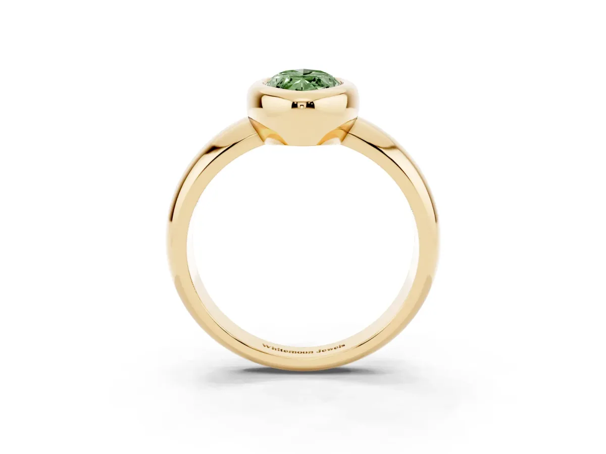Fancy Green Bezel Set Marquise Cut Solitaire Ring with Wide Band Yellow gold