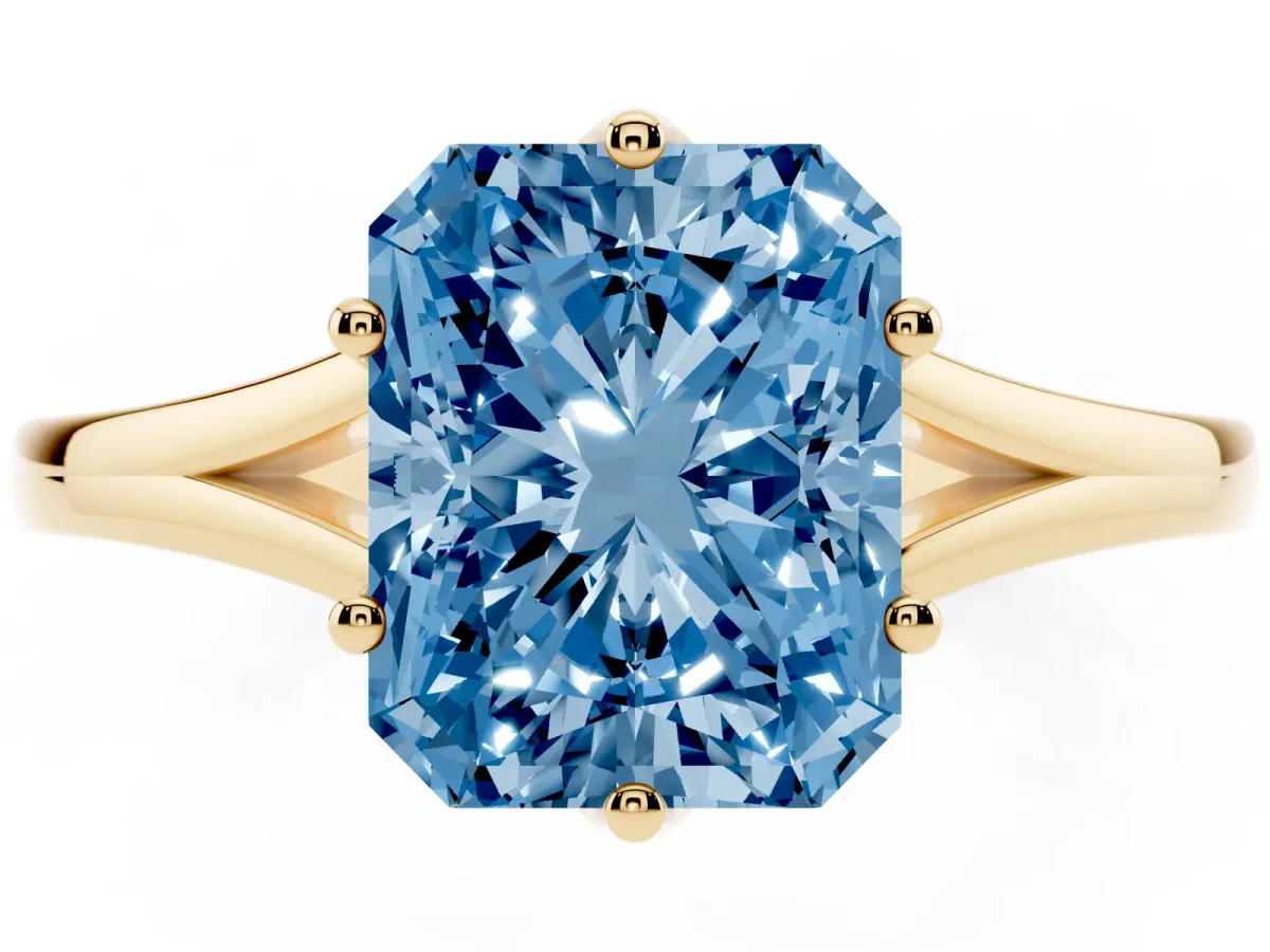 Fancy Blue Radiant Cut Solitaire Diamond Ring with Six-Prong Setting and Tapered Band Yellow gold