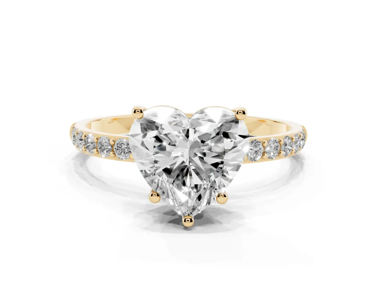 Heart Cut Diamond Solitaire Ring with Round Pavé Shoulders and Prong Setting Yellow gold
