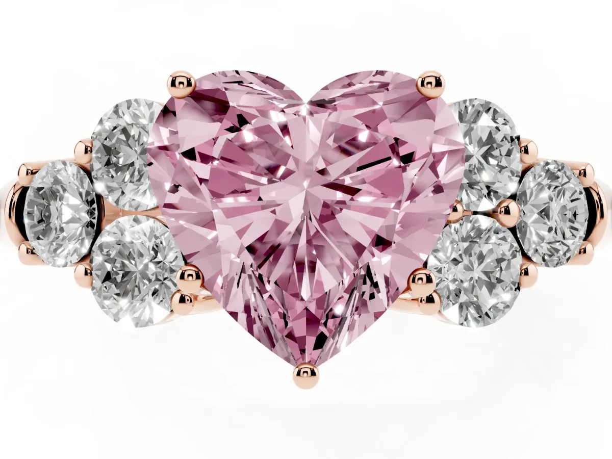 Fancy Pink Heart Cut Cut Diamond Cluster Ring with Round Accent Stones and Prong Setting on a Classic Band Rose gold