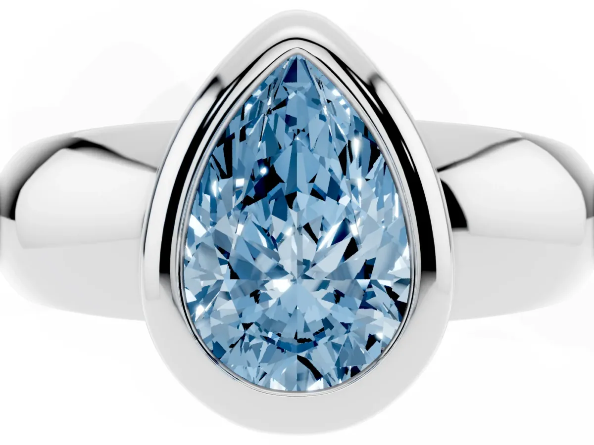 Fancy Blue Bezel Set Pear Cut Solitaire Ring with Wide Band Silver