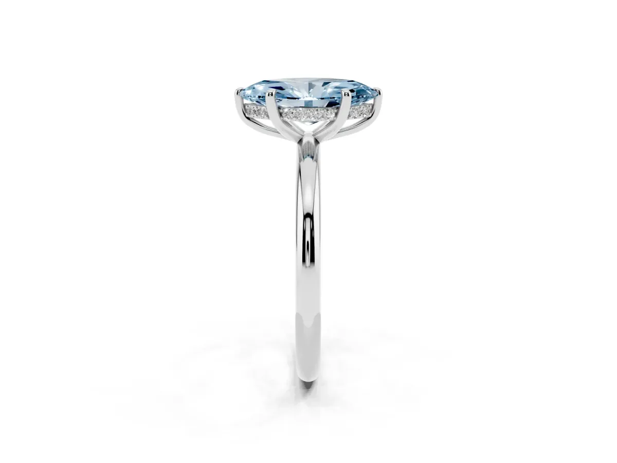 Fancy Blue Marquise Cut Diamond Solitaire Ring with Thin Band and Four-Prong Setting Silver