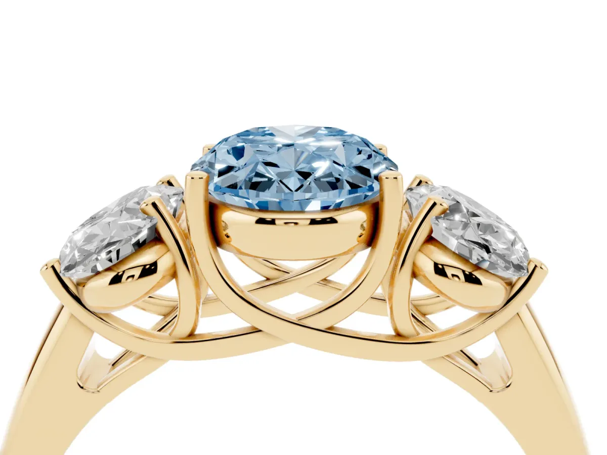 Fancy Blue Three-Stone Oval Cut Diamond Engagement Ring with Prong Setting Yellow gold