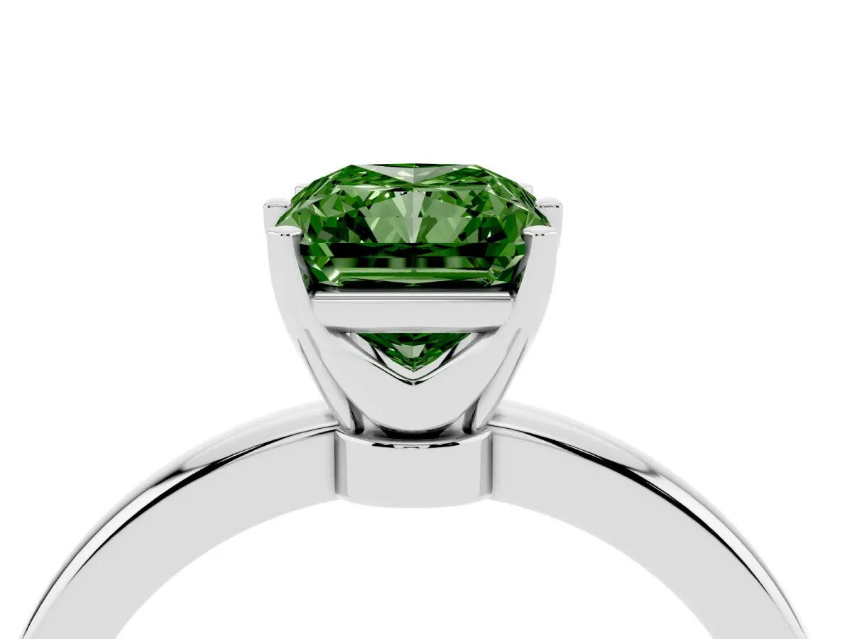 Fancy Green Radiant Cut Solitaire Diamond Ring with Six-Prong Setting on a Classic Band Silver