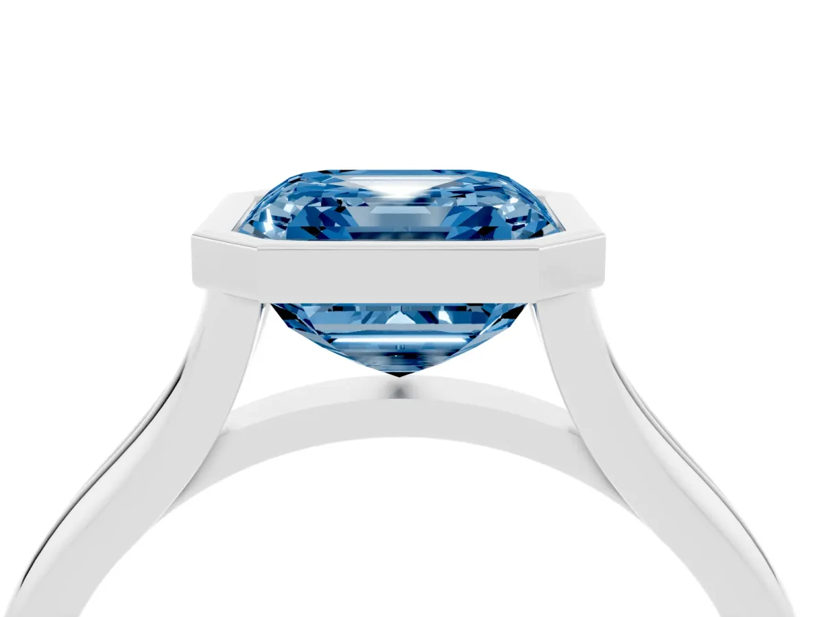 Fancy Blue Bezel Set Asscher Cut Cut Solitaire Ring with Tapered Band Silver