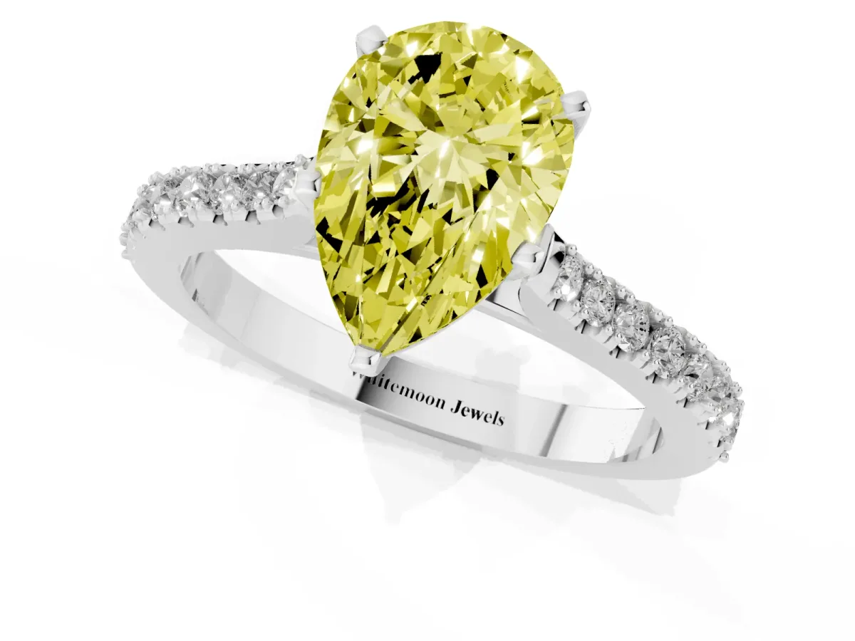 Fancy Yellow Pear Cut Cut Solitaire Diamond Engagement Ring with Pave Band and Four-Prong Setting Platinum