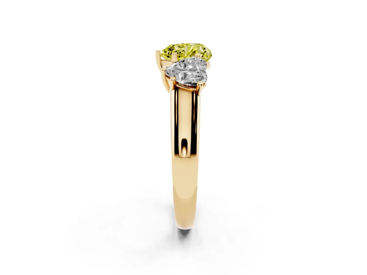 Fancy Yellow Heart Cut Three-Stone Diamond Ring with Prong Setting on a Classic Band Yellow gold