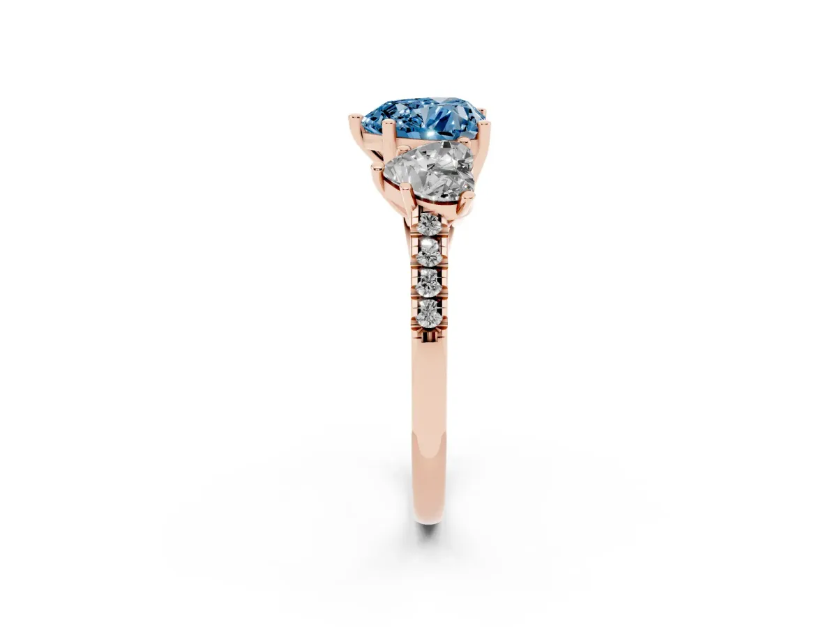 Fancy Blue Three-Stone Heart Cut Diamond Ring with Round Pavé Band and Prong Setting Rose gold