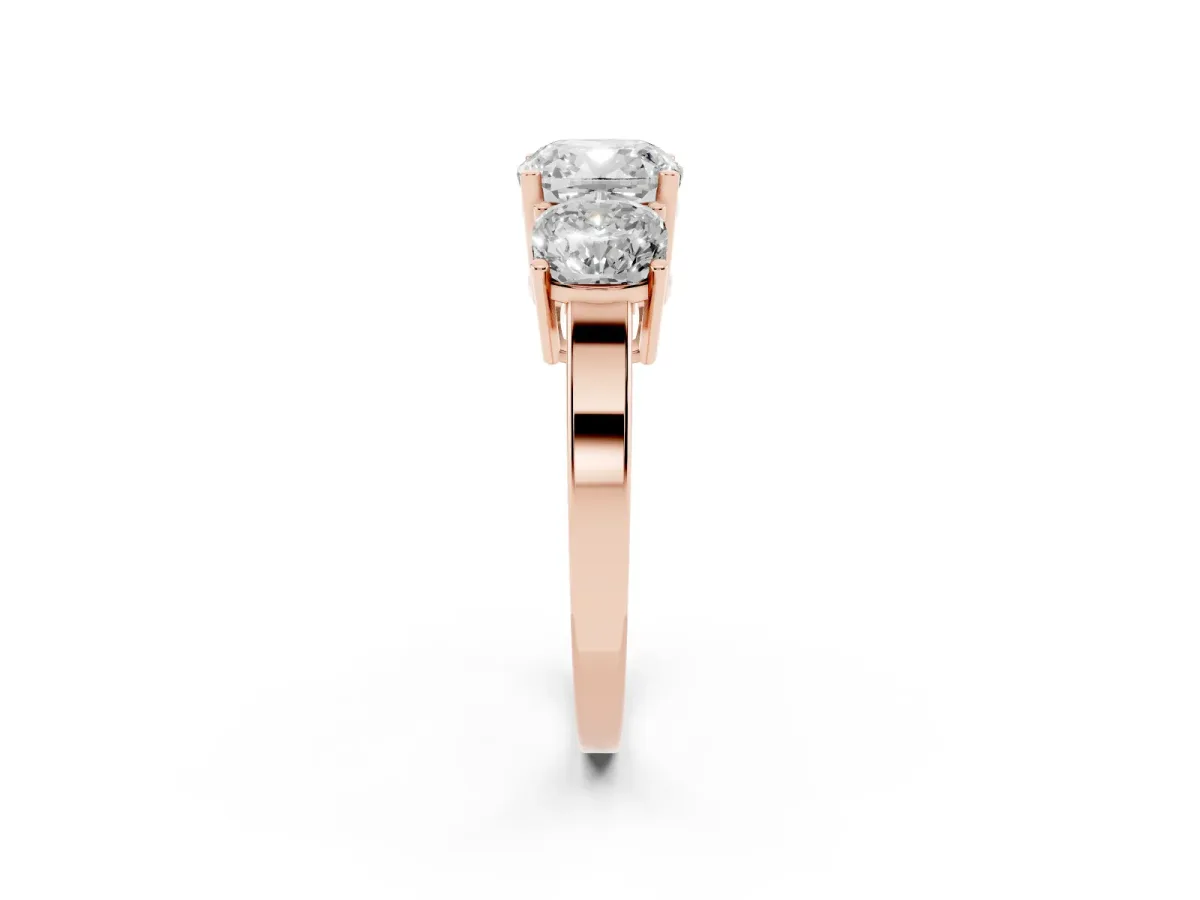 Three-Stone Cushion Cut Cut Diamond Engagement Ring with Flat Band and Four-Prong Setting Rose gold