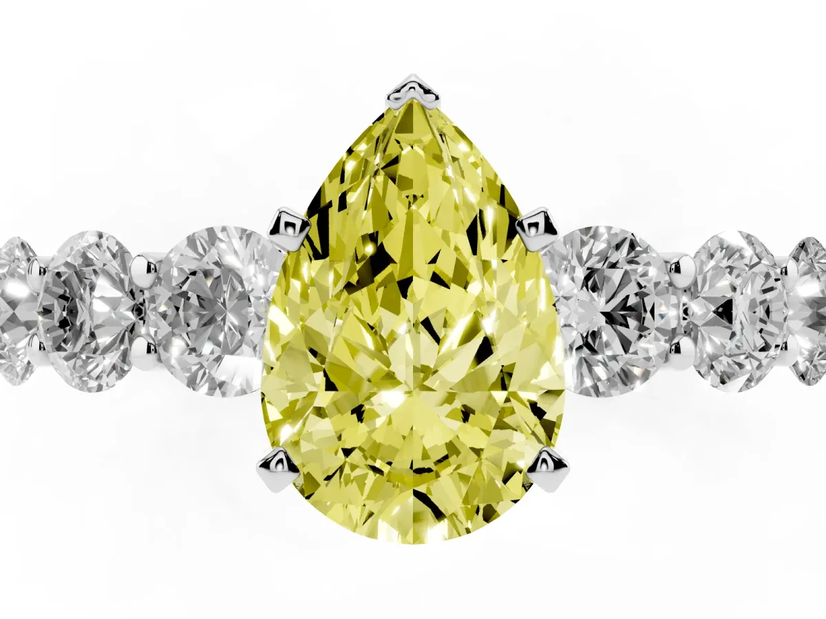 Fancy Yellow Pear Cut Diamond Prong Setting with Side Stones on a Pave Band Silver